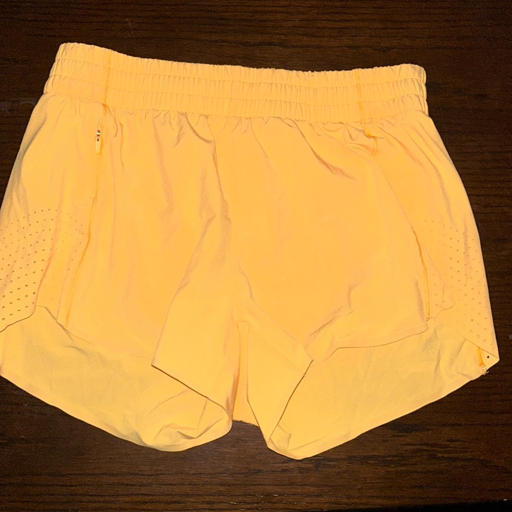 Orange Hustle 3” Athleta shorts XS